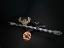 RG500 / RG400 rear caliper, hangar, and torque rod.